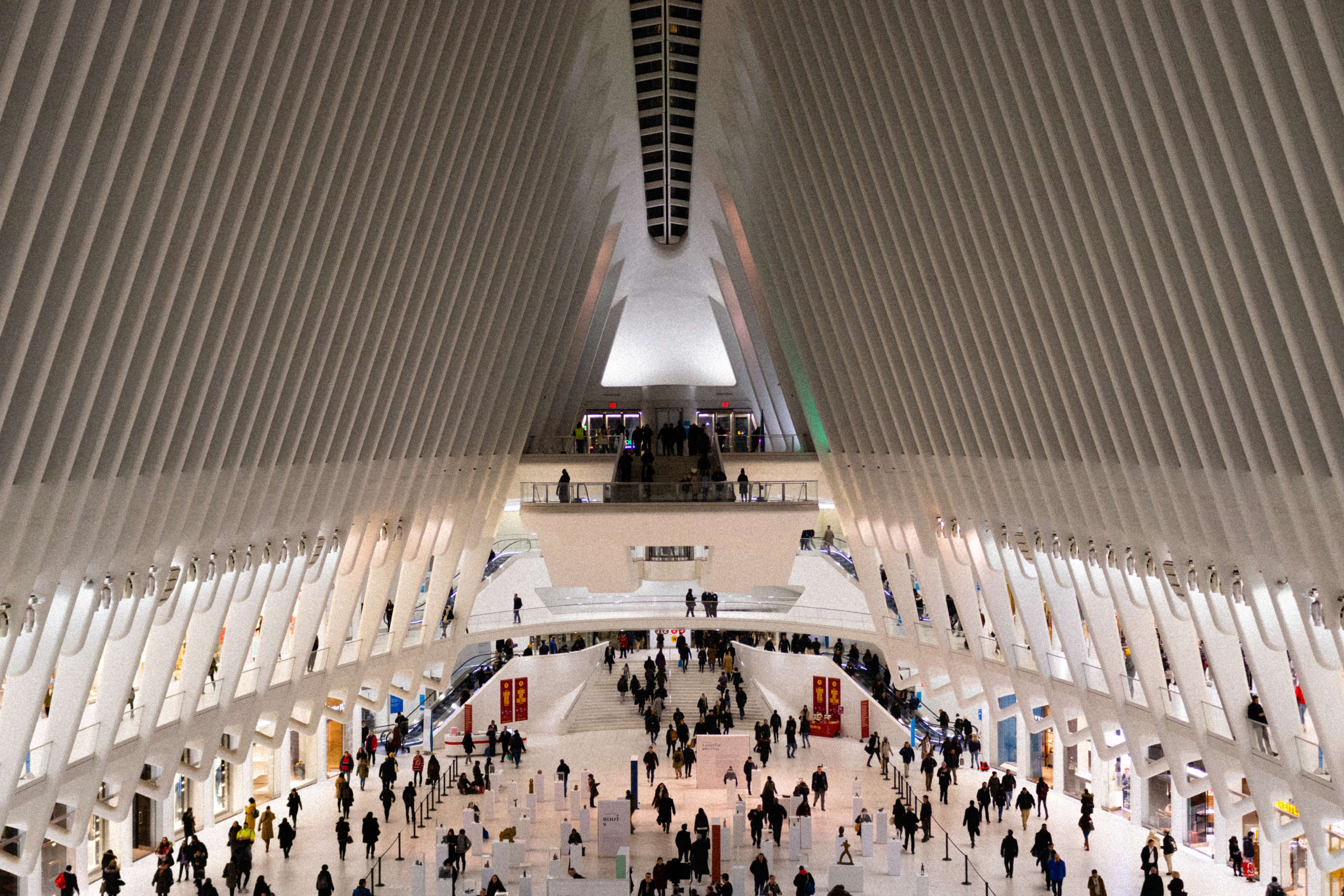 People wander the Oculus at the World Trade Center
